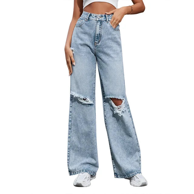 Blauwe losse gescheurde damesjeans hoge taille, rechte wijde pijpen