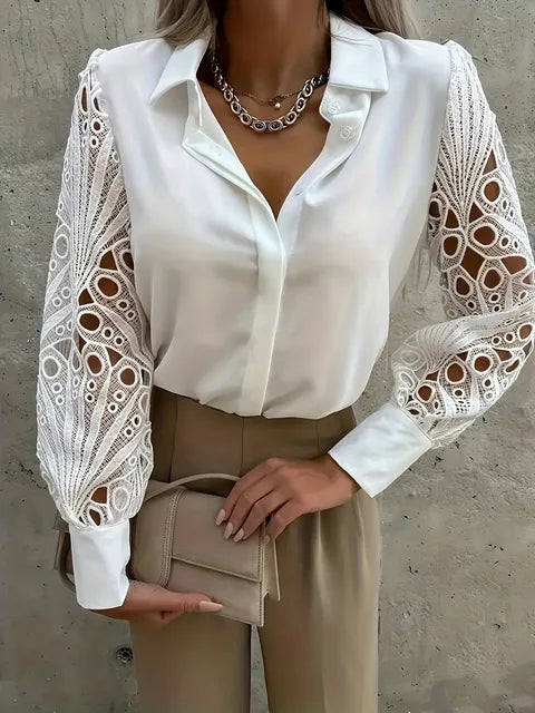 dames blouse met aparte opengewerkte kanten mouwen.